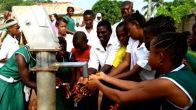 Students using a fresh water pump.